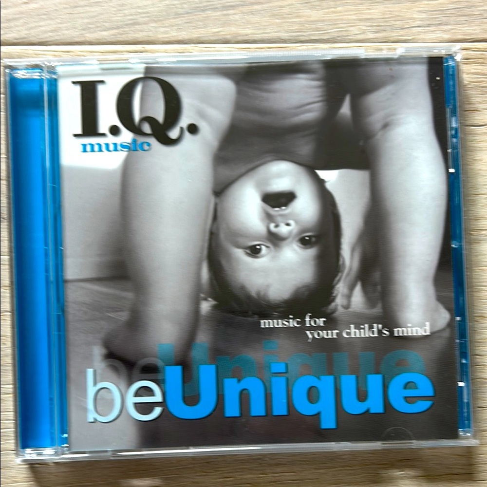 NWOT I.Q. Music “Be Unique” CD in Vibrant Blue and Soft Gray